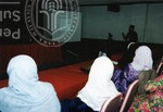 Pensyarah sedang beri kuliah